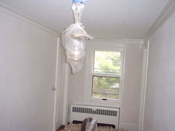 We carefully mask off unpaintable areas and use drop cloths in our preparation.